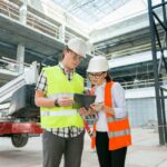 Industrial portrait of male and female construction engineers